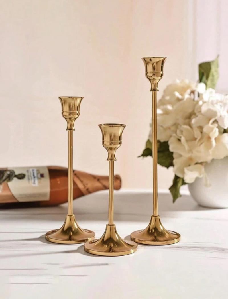 Set of 3 gold candle holders - $10<br>Battery operated candles included<br>for additional $2.50 for 3 candles.